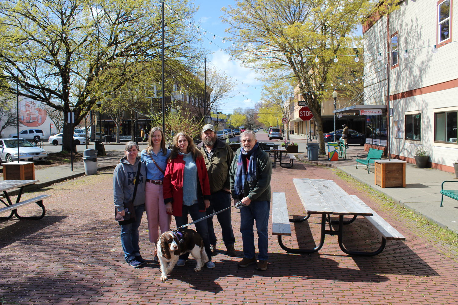 Centralia Farmers Market supporters Wanda Steger, Sarah Althauser, Marie Shankle, Brett Shankle, Bruce Yost and market mascot Beatrice gather in Pine Street Plaza earlier this year. After four seasons at the Centralia Factory Outlet, the market opened its season May 6 back in the heart of the downtown core.